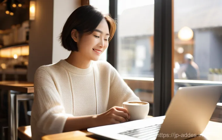광고디자인 독립 작업과 팀 작업 비교 - A young Japanese woman in her late 20s, with short, stylish hair, is working on a sleek silver lapto...